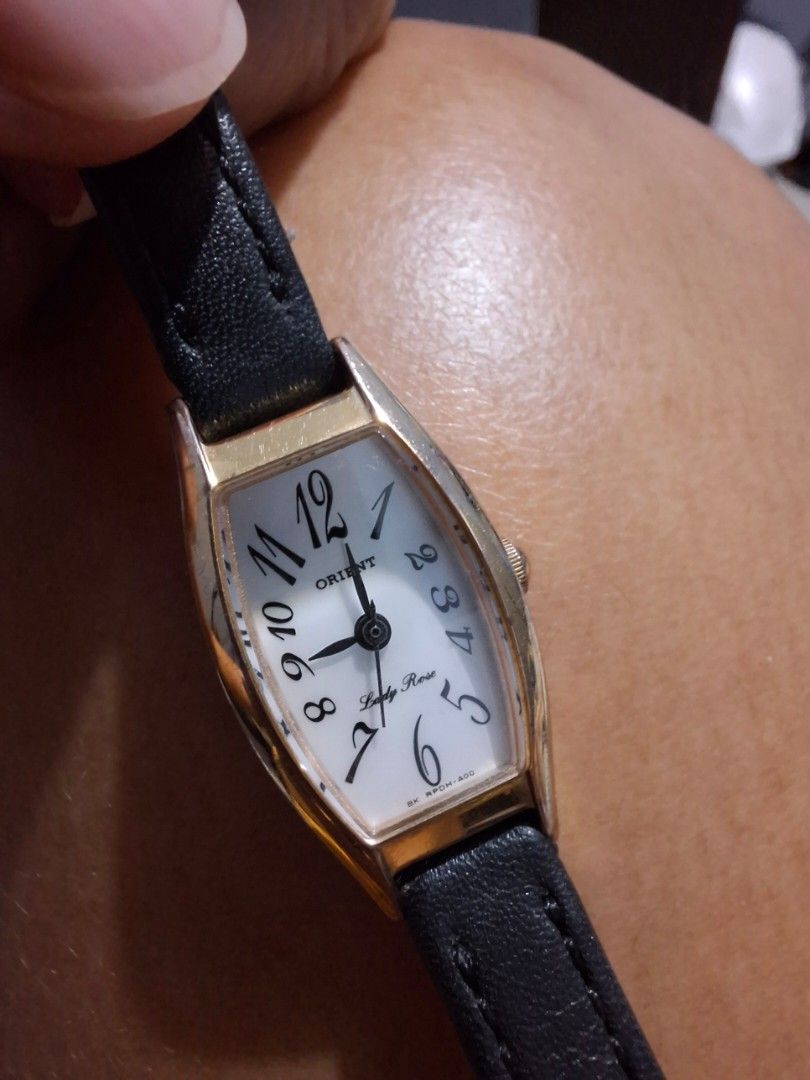 Orient-Lady Rose very RARE (Category: Women's Watches) located in Daet. Submitted by solsticecaliber (Listing ID 1463513385, Image 3). Description: •ORIENT WATCH CO. - JAPAN - Vintage Lady Rose collection - RARE •Tonneau / Barrel Shape - 16mm- 18mm mm elongated - Franck Muller homage style - not common round •White Porcelain Dial - large stylized Arabic numerals - Lady Rose script - elegant •Japan Quartz - slim tonneau caliber Key Specs: •Case: G