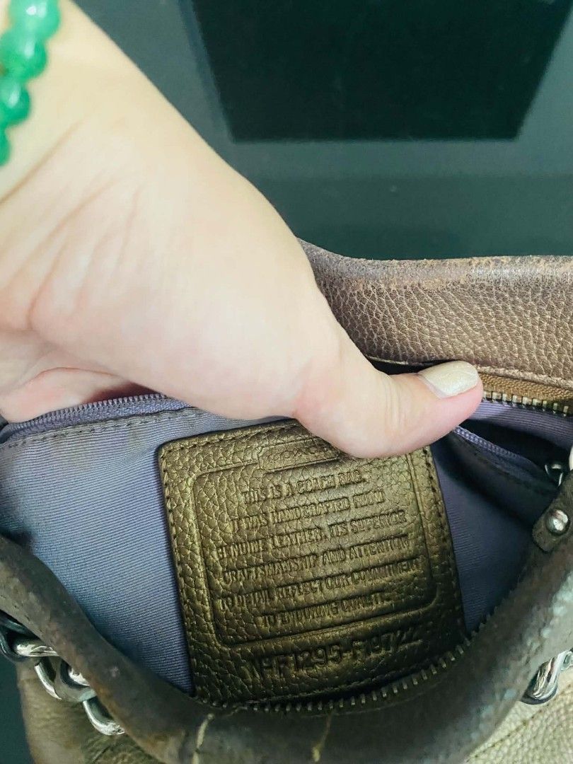 Original Coach messenger bag (Category: Cross-body Bags) located in Manila. Submitted by katzzaye (Listing ID 1463400424, Image 3). Description: genuine leather crossbody bag with bronze brown actual color. still presentable and good quality bag freebie awaits message me no return no exchange po salamat.
