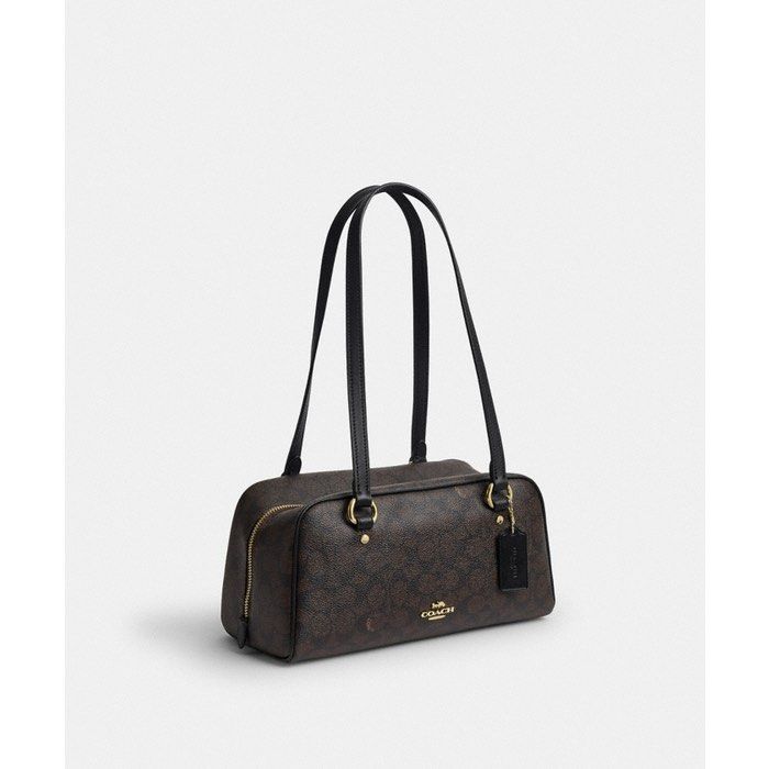 💯ORIGINAL COACH SYDNEY SHOULDER BAG (Category: Shoulder Bags) located in Quezon City. Submitted by ashongsstore (Listing ID 1463348056, Image 2). Description: ✨ C0ACH COLLECTION ✨ 🇵🇭AVAILABLE🇵🇭 Sydney Shoulder Bag In Signature Canvas The Sydney Shoulder Bag works well for the office or evenings out. This Signature canvas and smooth leather style has an inside snap pocket for added storage and comfortably fits a smartphone. STYLE NUMBER CFP04