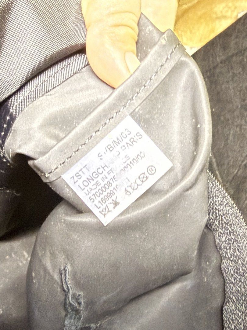 Original Long Champ Le Pliage Backpack (Category: Backpacks) located in Manila. Submitted by redprsnte (Listing ID 1463340441, Image 3). Description: Used less than five times. Switched to the bigger size. Can fit macbook 13 inches. NEGOTIABLE PLS PM FOR OFFER.