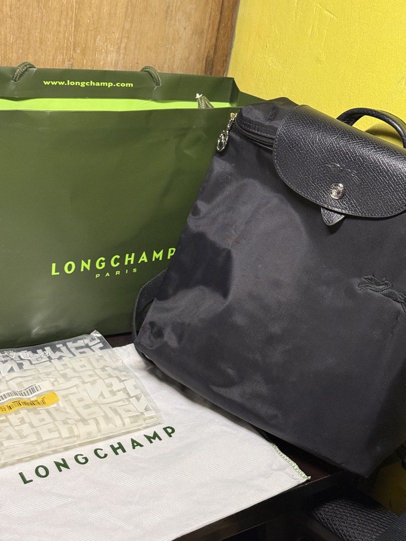 Original Long Champ Le Pliage Backpack (Category: Backpacks) located in Manila. Submitted by redprsnte (Listing ID 1463340441, Image 1). Description: Used less than five times. Switched to the bigger size. Can fit macbook 13 inches. NEGOTIABLE PLS PM FOR OFFER.