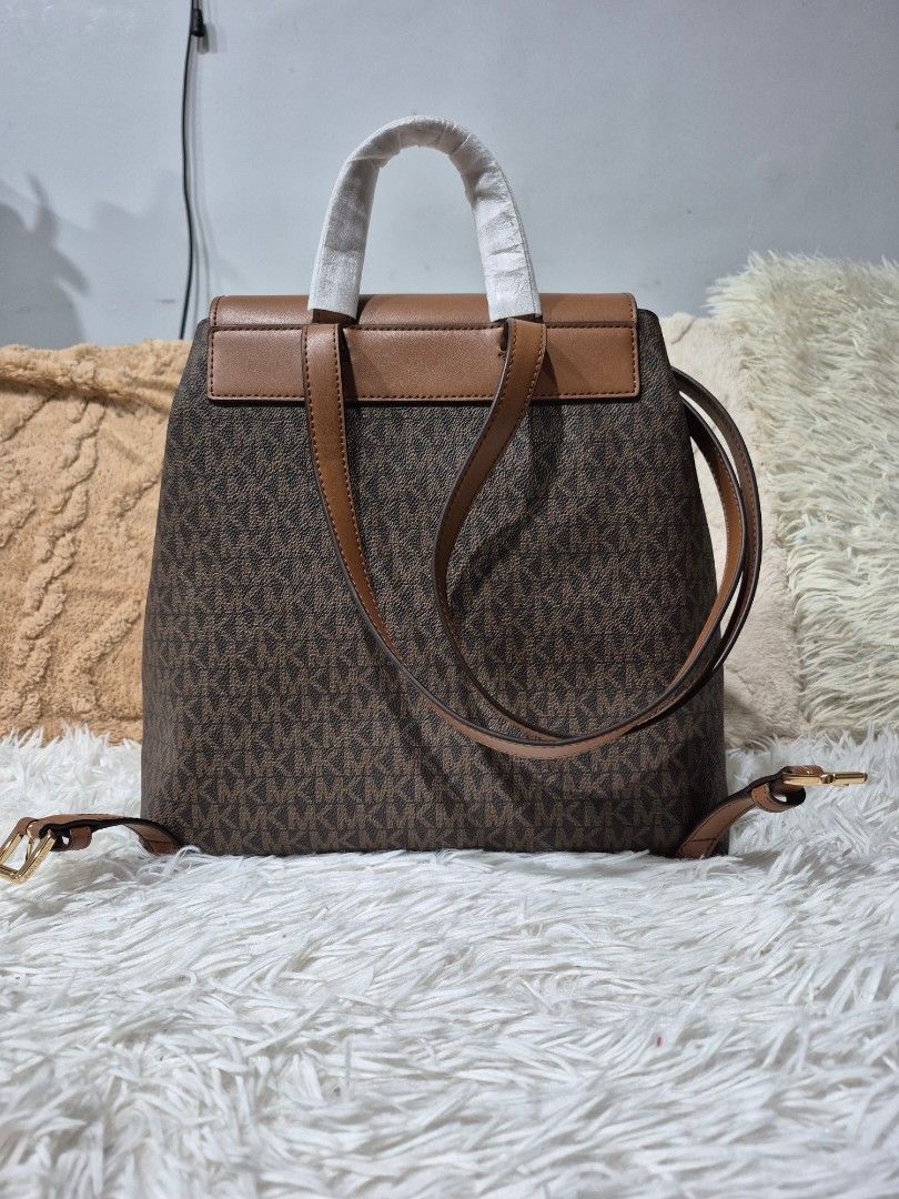 Original Micharl Kors Backpack (Category: Backpacks) located in Cavite. Submitted by chaellebrandsluxe (Listing ID 1463344519, Image 2). Description: No inclusion,selling low what you see is what you get.