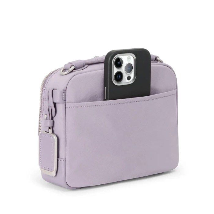💯ORIGINAL TUMI TEGHAN CROSSBODY (Category: Cross-body Bags) located in Quezon City. Submitted by ashongsstore (Listing ID 1463338654, Image 2). Description: ✨T.U.M.I COLLECTION✨ 🇵🇭AVAILABLE🇵🇭 Teghan Crossbody Meet the Teghan Crossbody, a classically compact style. This casual carry features a dimensional quilted pattern on black nylon, accented with silver hardware. Exterior - Double-zip entry to main compartment - Double-zip entry to front 
