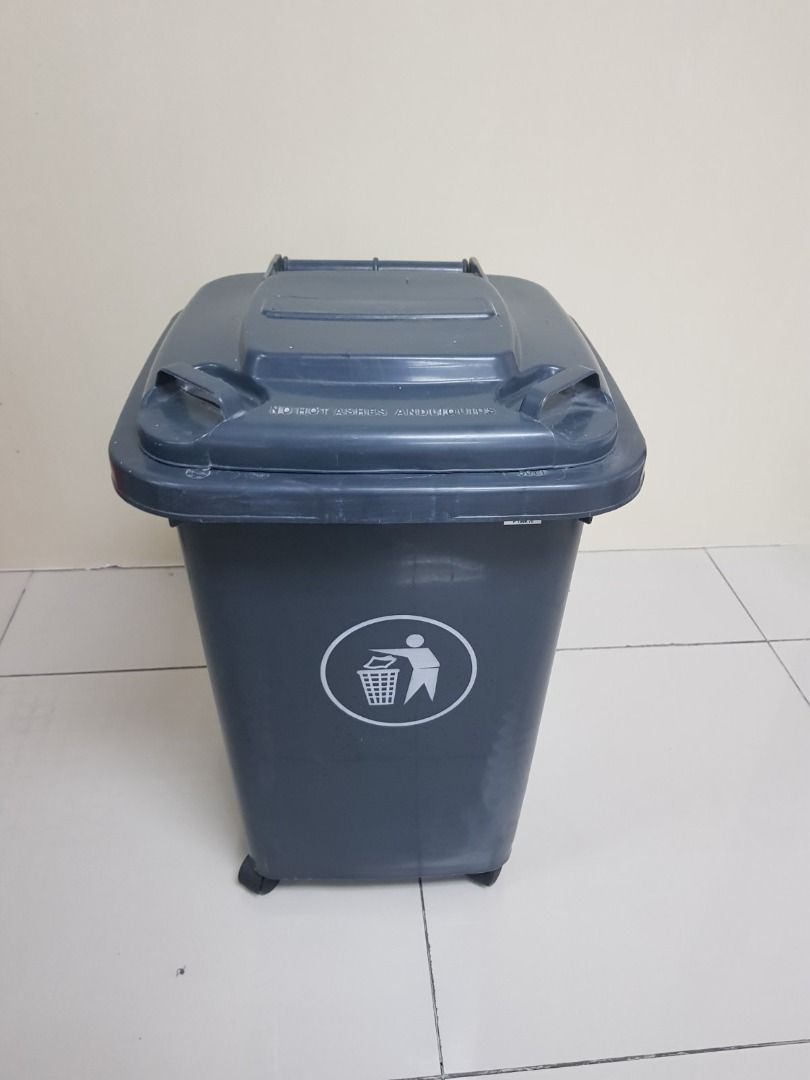 Outdoor Recycle Trash Can Plastic Garbage Bins Waste Trash Bin (Category: Waste Bins & Bags) located in Quezon City. Submitted by midaceph (Listing ID 1463396143, Image 3). Description: - Grey trash bin with wheels and lid - Features a recycling symbol on the front - Yellow accent handle on the lid - Ideal for home or office use - Easy to move around to wheels - Approximate dimensions: [insert dimensions if known].