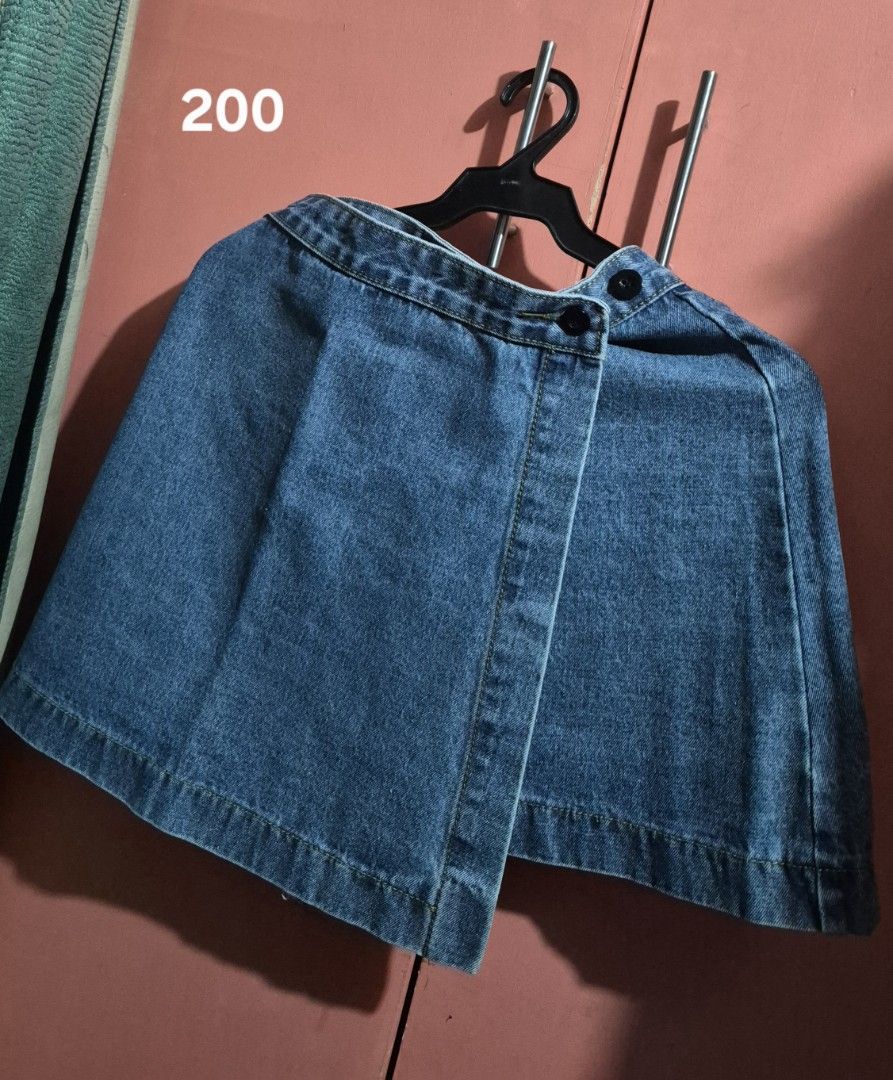 Overlap denim skirt (Category: Skirts) located in Imus. Submitted by shopestepanimey (Listing ID 1463375230, Image 1). Description: - Washed but never worn - Estimated size: Medium.