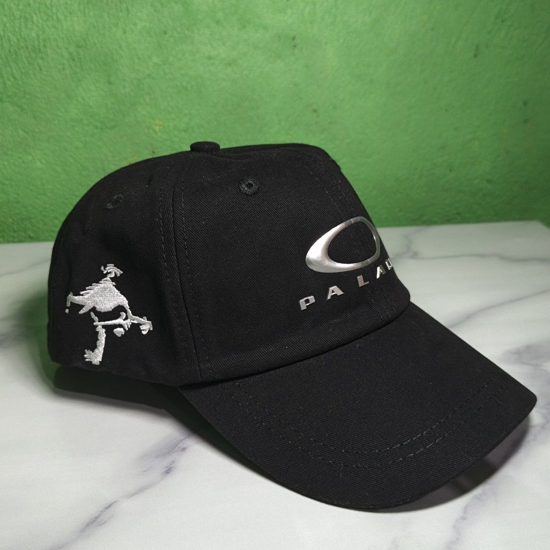 Palace x Oakley 6-Panel cap (High Quality Replica (Category: Caps & Hats) located in Dasmarinas. Submitted by nifty_n00k (Listing ID 1463328452, Image 3). Description: - Authentic Palace x Oakley collaboration cap - Classic black colorway - Features a small embroidered graphic on the side - Iconic Oakley logo embroidered on the back - Adjustable strap for a customized, comfortable fit - Perfect for everyday casual wear - Brand new with tags attac