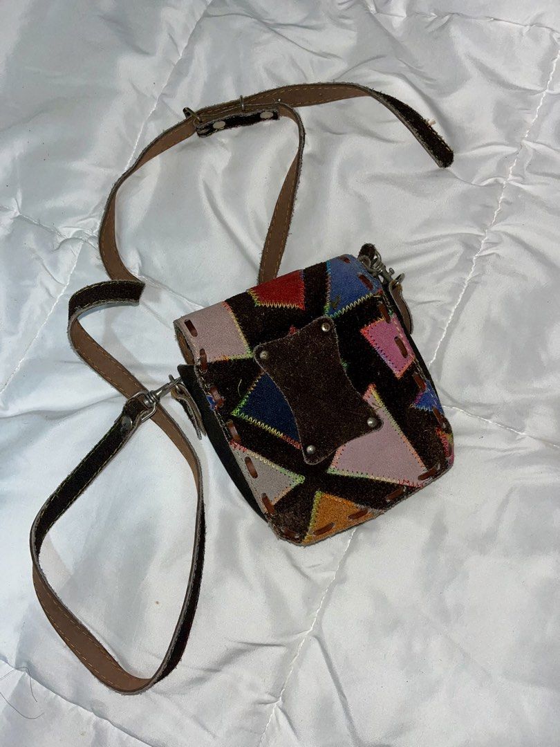 Patchwork Leather Crossbody Bag with Shoulder Strap (Category: Cross-body Bags) located in Quezon. Submitted by nami1322 (Listing ID 1463408071, Image 3). Description: - Unique patchwork design with genuine leather pieces. - Secure clasp closure to keep your belongings safe. - Adjustable leather shoulder strap for comfortable wear. - Perfect for carrying daily essentials. - Adds a fun, bohemian flair to any outfit..