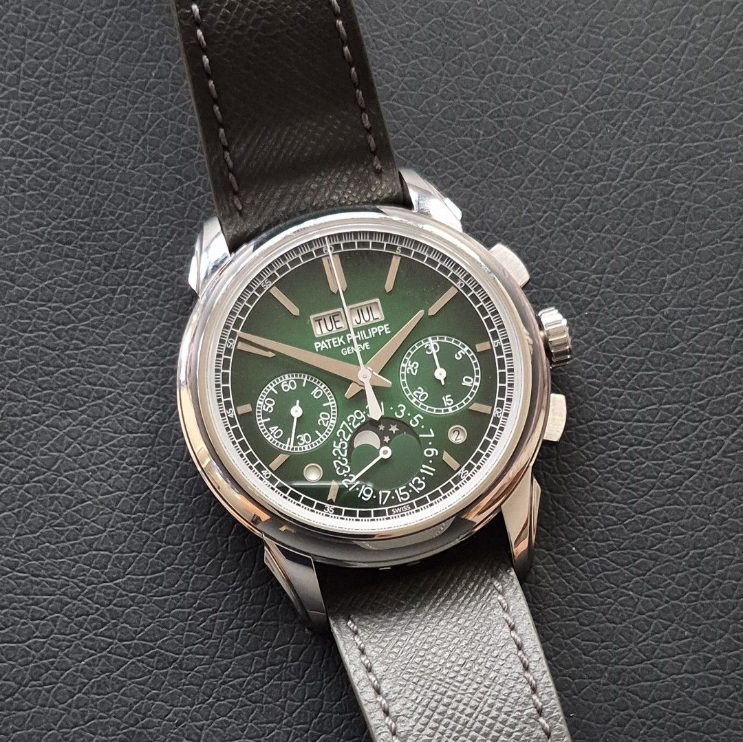 Patek Philippe 5270P-014 (Category: Watches) located in Singapore. Submitted by goh7777 (Listing ID 1463395101, Image 1). Description: Patek Philippe 5270P-014 Perpetual Calendar Chronograph in mint condition and under factory warranty until 2029 for sale. Full set with US AD stamped Certificate of Origin (dated Aug-2024), envelope, solid case back, stylus, leather folder, manuals, cleaning cloth, wooden box and outer boxes. Fitted on an aftermar