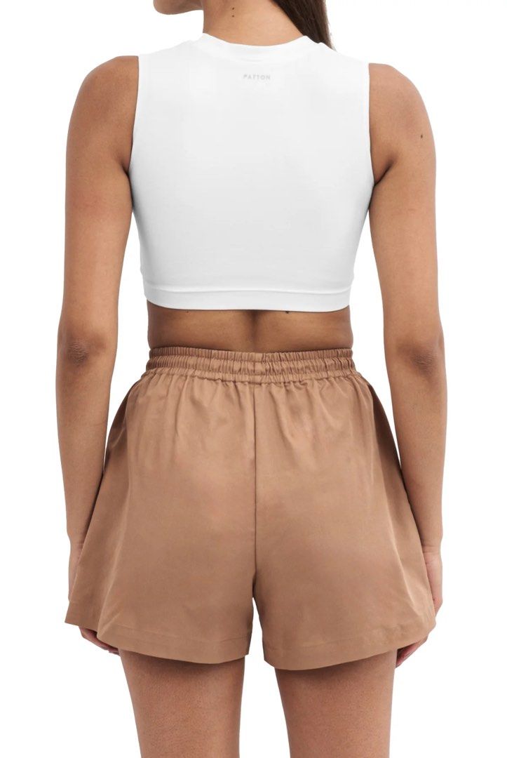 Patton Sleeveless cropped top (Category: Others Tops) located in Quezon City. Submitted by tan__k (Listing ID 1463415801, Image 3). Description: Size Small Color cloud No flaws A fitted sleeveless top with a cropped length, crew neckline, and an embroidered logo. 68% Rayon, 27% Recycled Nylon & 5% Spandex Designed in Italy, Made in Manila Intended for a tight fit. .