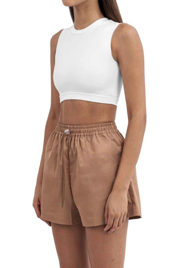 Patton Sleeveless cropped top (Category: Others Tops) located in Quezon City. Submitted by tan__k (Listing ID 1463415801, Image 2). Description: Size Small Color cloud No flaws A fitted sleeveless top with a cropped length, crew neckline, and an embroidered logo. 68% Rayon, 27% Recycled Nylon & 5% Spandex Designed in Italy, Made in Manila Intended for a tight fit. .