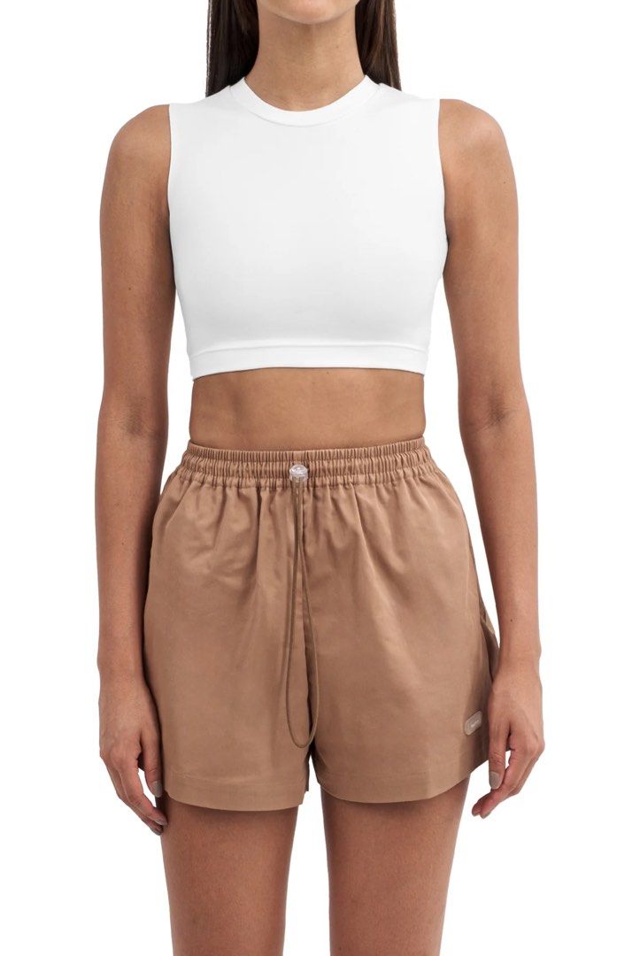 Patton Sleeveless cropped top (Category: Others Tops) located in Quezon City. Submitted by tan__k (Listing ID 1463415801, Image 1). Description: Size Small Color cloud No flaws A fitted sleeveless top with a cropped length, crew neckline, and an embroidered logo. 68% Rayon, 27% Recycled Nylon & 5% Spandex Designed in Italy, Made in Manila Intended for a tight fit. .