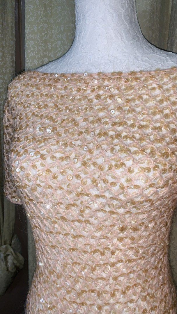 PDMS Sequin Mesh Boat Neck Top Size M (Category: Sleeveless) located in Dagupan City. Submitted by sj_styles0910. (Listing ID 1463531258, Image 2). Description: - Light pink mesh top - Adorned with gold sequins - Features a boat neck and short sleeves - Sheer material with a subtle diamond pattern - Estimated size: Medium - Versatile for layering or evening wear.