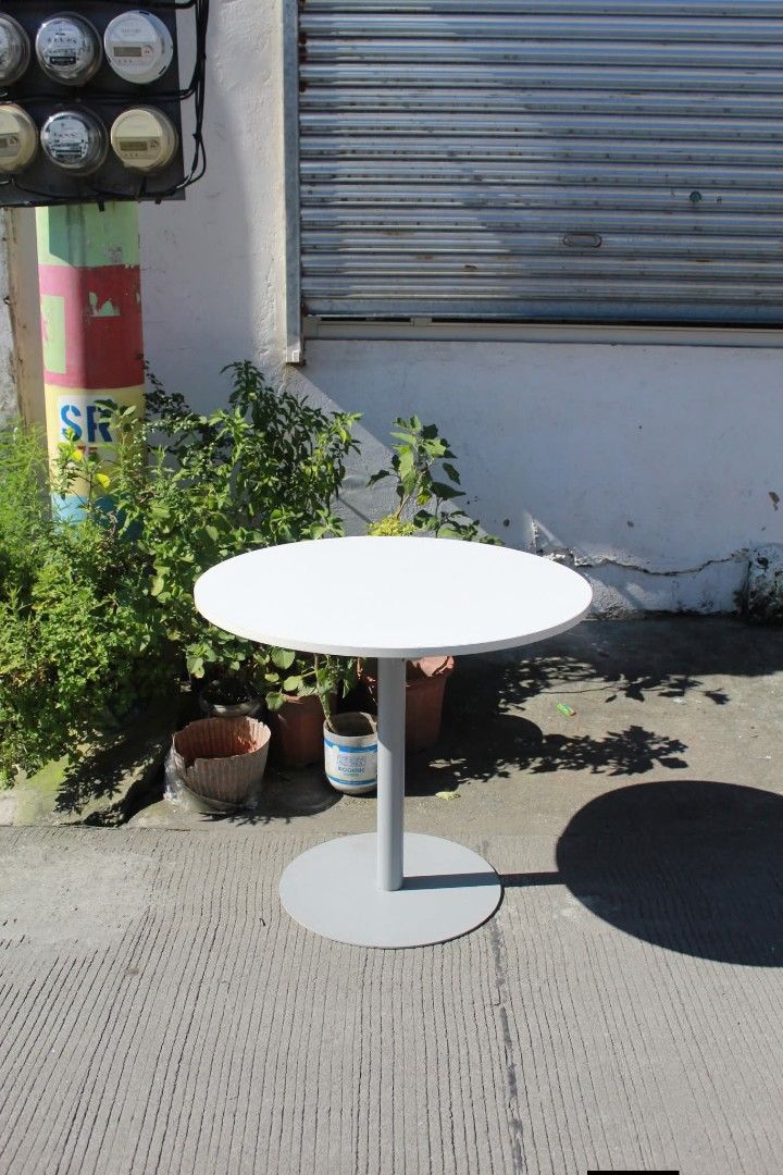 Pedestal Cafe Table (Category: Tables & Sets) located in Meycauayan. Submitted by marygracecasimiro (Listing ID 1463385528, Image 2). Description: Round Minimalist Pedestal Cafe Table White tabletop and sturdy metal base in a neutral grey finish. Its space-saving design provides ample legroom and is perfect for cafes, dining areas, balconies, offices or compact spaces L:31 ½ • W:31 ½ • H:27 ¾ inches 3,800 pesos only🩷🧡 #highlightsシ゚ #followersan