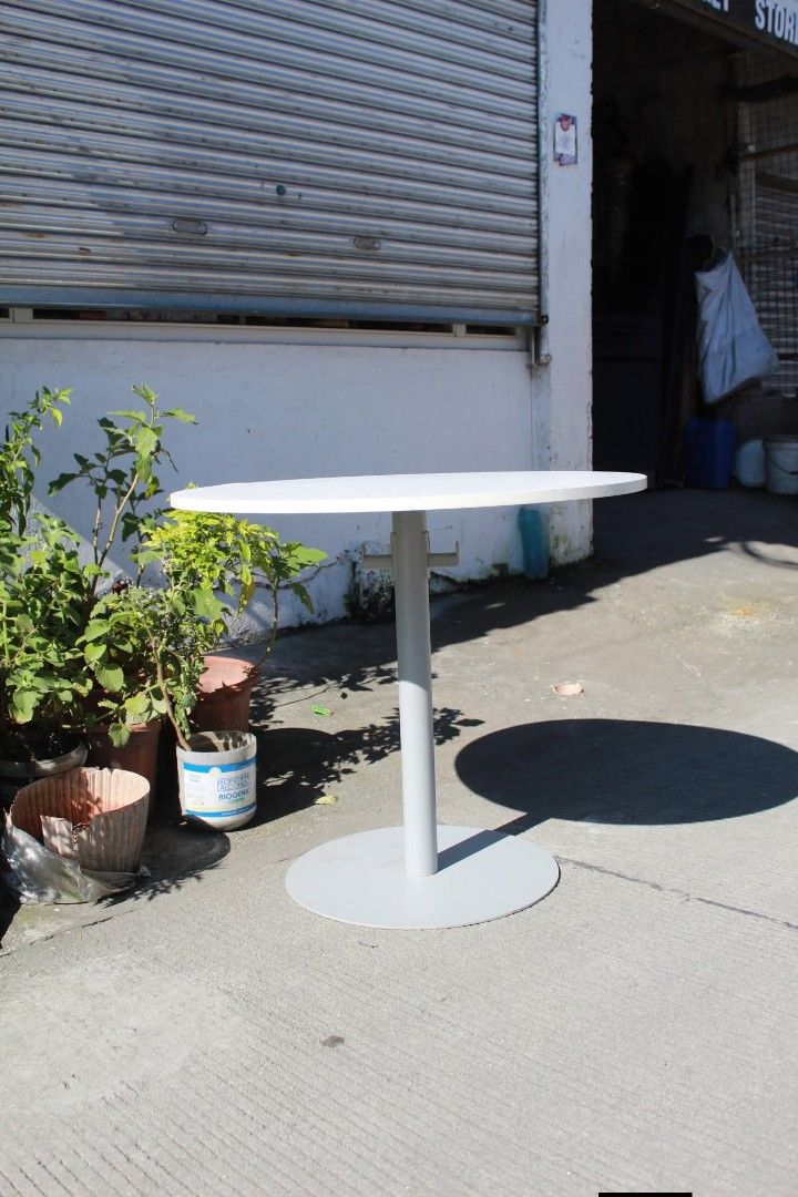 Pedestal Cafe Table (Category: Tables & Sets) located in Meycauayan. Submitted by marygracecasimiro (Listing ID 1463385528, Image 3). Description: Round Minimalist Pedestal Cafe Table White tabletop and sturdy metal base in a neutral grey finish. Its space-saving design provides ample legroom and is perfect for cafes, dining areas, balconies, offices or compact spaces L:31 ½ • W:31 ½ • H:27 ¾ inches 3,800 pesos only🩷🧡 #highlightsシ゚ #followersan
