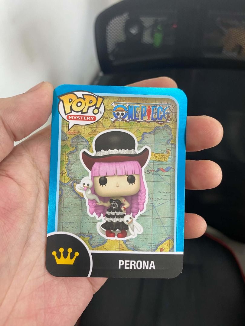 Perona Funko! Chase! #2451 New! (Category: Designer & Blind Box Toys) located in Quezon City. Submitted by u335384 (Listing ID 1463328529, Image 3). Description: Perona Funko Pop! Chase! #2451 from the One Piece franchise. This collectible figure is part of the Pop! Vinyl collection by Funko and features the character Perona in standard size with multicolor design. It includes a card and is made of vinyl material, standing at 4 inches tall. This 