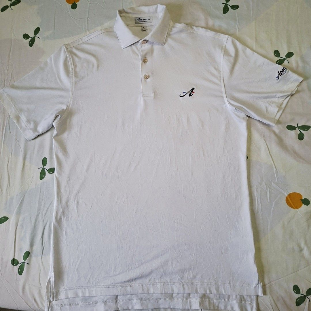 Peter Millar Golf White Polo Shirt (Category: Activewear) located in Rizal. Submitted by carou66859 (Listing ID 1463339994, Image 1). Description: This is a white Peter Millar Golf Summer Comfort Performance Polo shirt featuring a three-button placket and an embroidered "A" monogram on the chest.Size 21 inches width and 29 inches length.Price is 475 only.Rizal area.Shipping sagot ng buyer. The retail price for a new Peter Millar Summer Comfort po