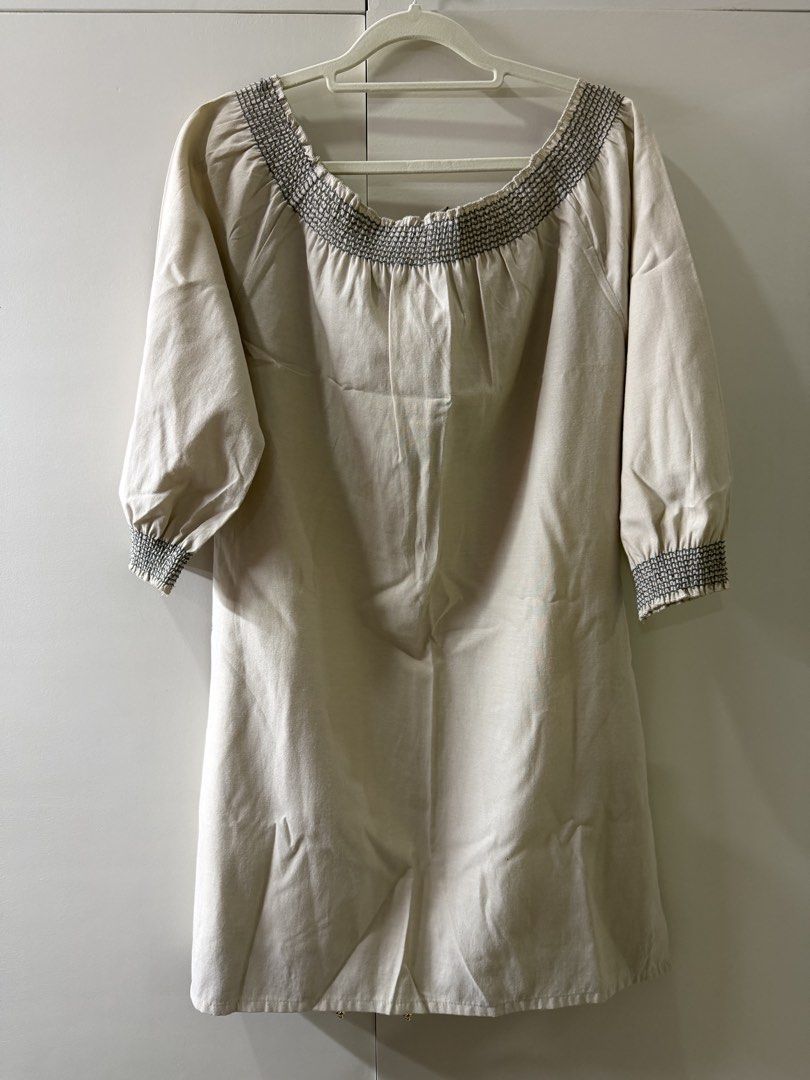 Petit Monde Basic Beige Embroidered Smocked Neck Dress Size M (Category: Dresses) located in Rosario. Submitted by lovedtwiceph (Listing ID 1463360373, Image 3). Description: - Beige dress from Petit Monde Basic - Smocked neckline with beautiful embroidery - Three-quarter sleeves with smocked cuffs - Embroidered hem detail - Easy to wear and comfortable - Ideal for casual outings.