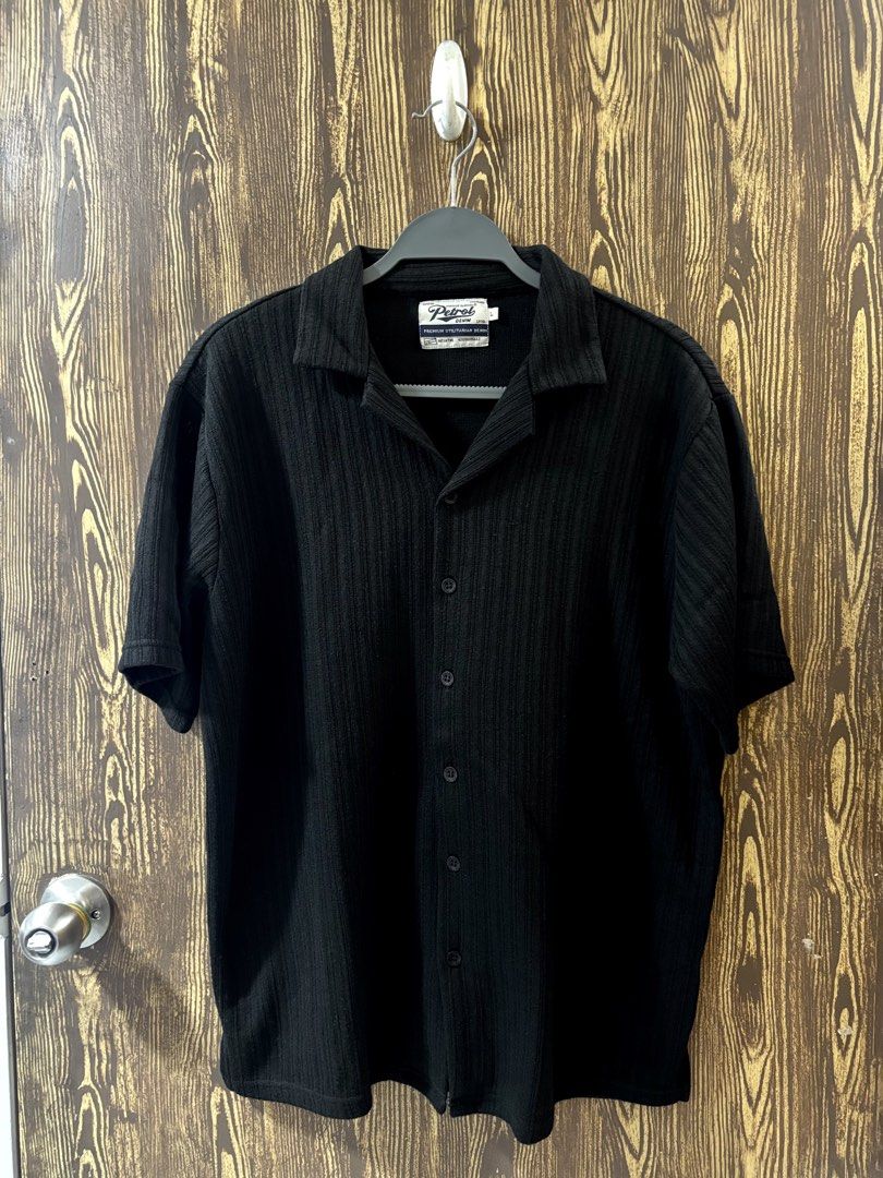 PETROL Black Textured Button-Down Shirt (Category: Tshirts & Polo Shirts ) located in Makati City. Submitted by closet_by_mka (Listing ID 1463518269, Image 1). Description: PETROL Black Textured Button-Down Shirt ✨ Brand new — super good condition! Love the subtle textured fabric on this one! 🖤 Gives a simple black shirt a little more character without being too loud. • Short sleeves • Button-down front • Textured fabric • Relaxed/casual fit • C