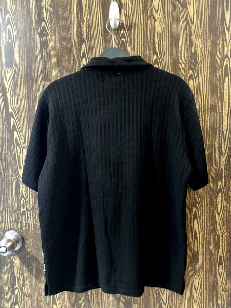 PETROL Black Textured Button-Down Shirt (Category: Tshirts & Polo Shirts ) located in Makati City. Submitted by closet_by_mka (Listing ID 1463518269, Image 3). Description: PETROL Black Textured Button-Down Shirt ✨ Brand new — super good condition! Love the subtle textured fabric on this one! 🖤 Gives a simple black shirt a little more character without being too loud. • Short sleeves • Button-down front • Textured fabric • Relaxed/casual fit • C