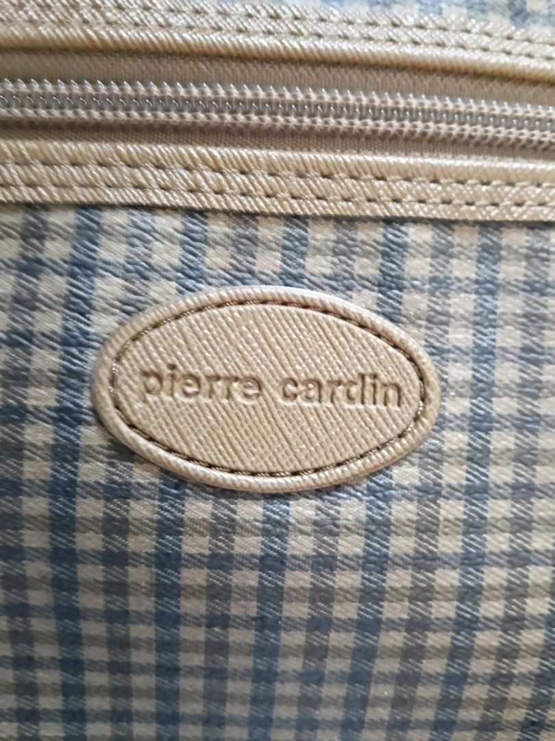 Pierre Cardin Shoulder Bag - Checked Pattern (Category: Belt bags, Clutches and Pouches) located in Antipolo. Submitted by vastgem_4c8da8 (Listing ID 1463351710, Image 3). Description: - Classic Pierre Cardin shoulder bag - Timeless checked pattern with elegant tan trim - Secure zipper closure on top - Features a small oval Pierre Cardin logo on the front - Ideal for everyday use or travel - Spacious interior to hold all your essentials.