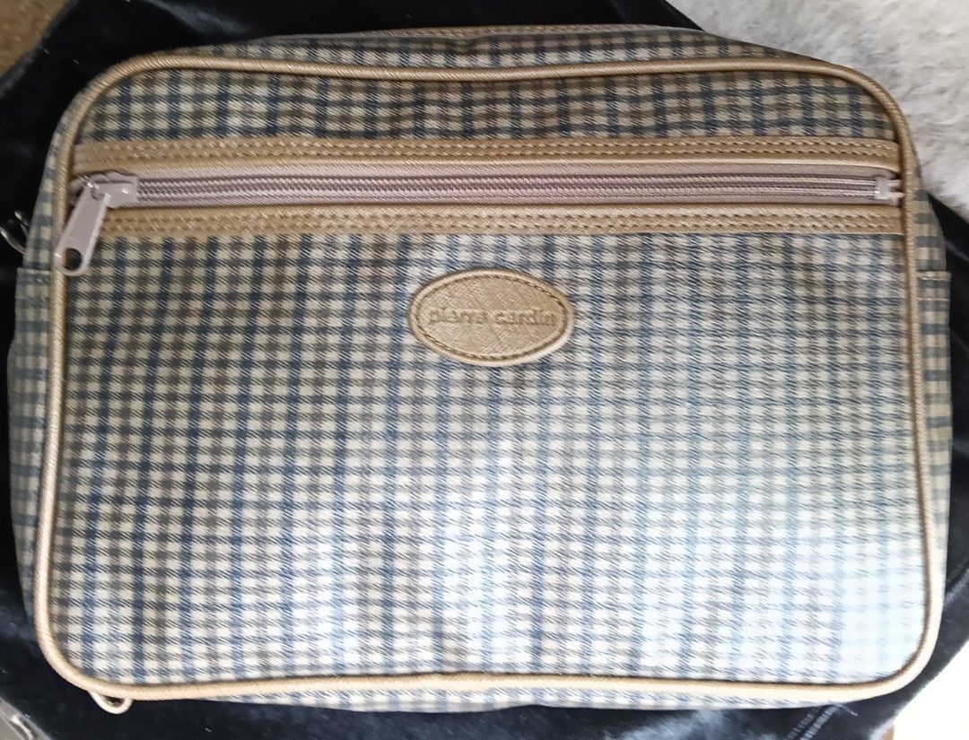 Pierre Cardin Shoulder Bag - Checked Pattern (Category: Belt bags, Clutches and Pouches) located in Antipolo. Submitted by vastgem_4c8da8 (Listing ID 1463351710, Image 2). Description: - Classic Pierre Cardin shoulder bag - Timeless checked pattern with elegant tan trim - Secure zipper closure on top - Features a small oval Pierre Cardin logo on the front - Ideal for everyday use or travel - Spacious interior to hold all your essentials.