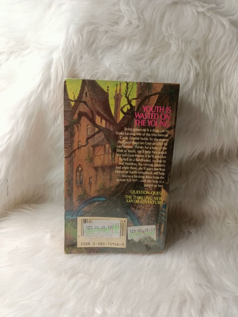 Piers Anthony Question Quest The New Xanth Novel (Category: Storybooks) located in Tumauini. Submitted by qeynichi (Listing ID 1463326885, Image 2). Description: - Title: Piers Anthony's Question Quest - Series: New Xanth Novel - Format: Paperback - Cover Art: Features a cool dragon and figures - Condition: Pages yellowed from age, spine has some wear - Genre: Fantasy - Recommended for: Fans of the Xanth series.