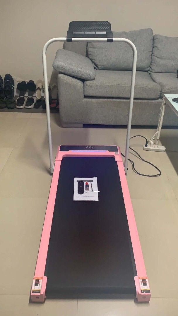 Pink Folding Treadmill with Remote (Category: Cardio & Fitness Machines) located in Rizal. Submitted by rayjeansulmaca7 (Listing ID 1463402977, Image 2). Description: - Compact pink treadmill - Folds for easy storage - Comes with remote control and manual - Perfect for home workouts - Easy to set up and use - Great for walking or light jogging indoors.