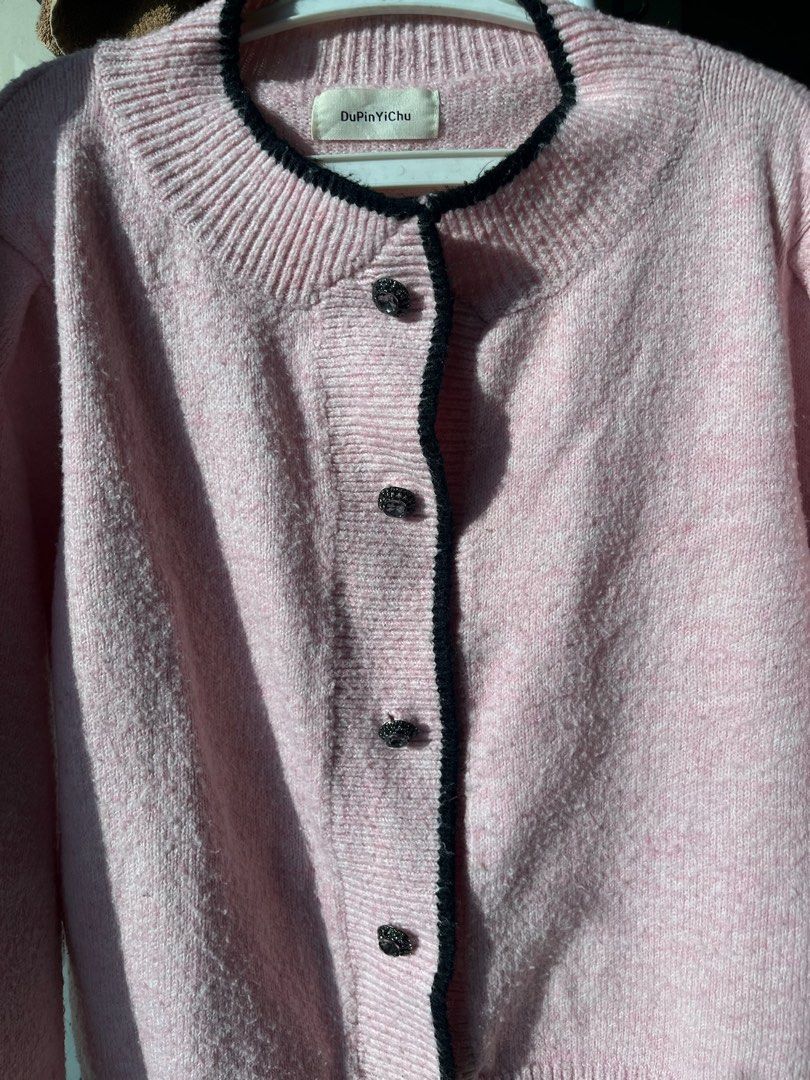 Pink Knit Cardigan Two Tone (Category: Coats, Jackets and Outerwear) located in Manila. Submitted by formyfunds (Listing ID 1463532219, Image 3). Description: Hindi makati 💖 Small to large (stretchy material) Best fit small to semi large para di gaano fit. - Pink Two Toned knit cardigan - 🐱Adorable button details - Long sleeves with ribbed cuffs - Cozy and stylish, ideal for layering.