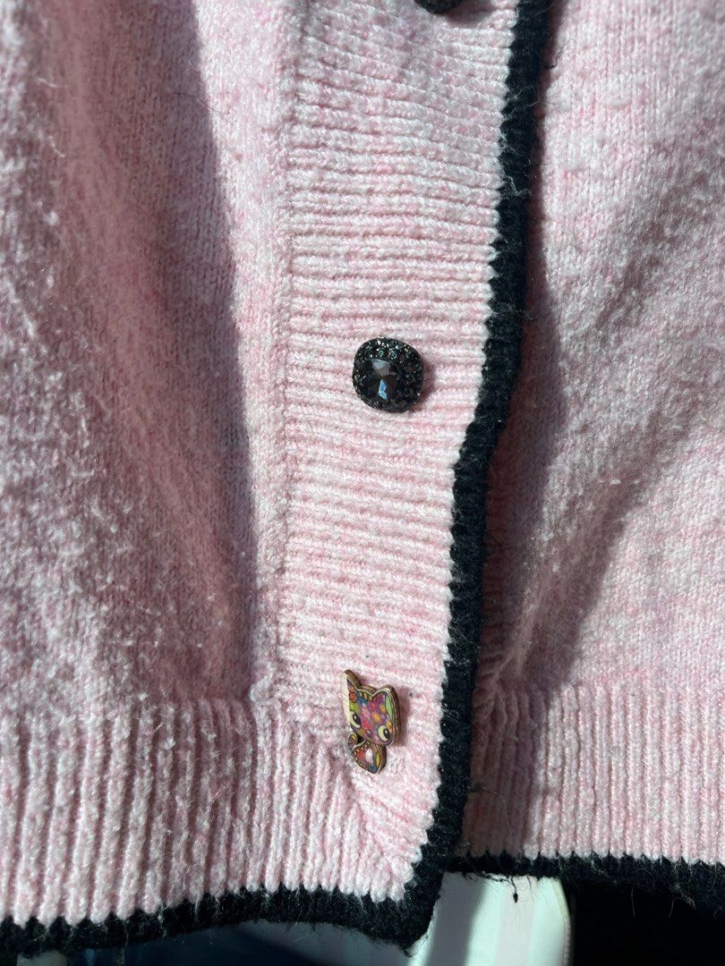 Pink Knit Cardigan Two Tone (Category: Coats, Jackets and Outerwear) located in Manila. Submitted by formyfunds (Listing ID 1463532219, Image 2). Description: Hindi makati 💖 Small to large (stretchy material) Best fit small to semi large para di gaano fit. - Pink Two Toned knit cardigan - 🐱Adorable button details - Long sleeves with ribbed cuffs - Cozy and stylish, ideal for layering.