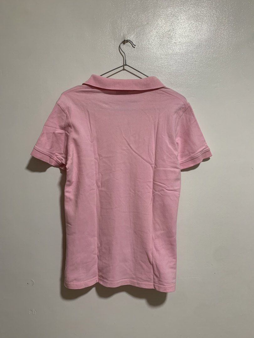 pink Lacoste short-sleeve polo (Category: Shirts) located in Manila. Submitted by nikwieue (Listing ID 1463371527, Image 2). Description: may maliliit na stain, washable naman.