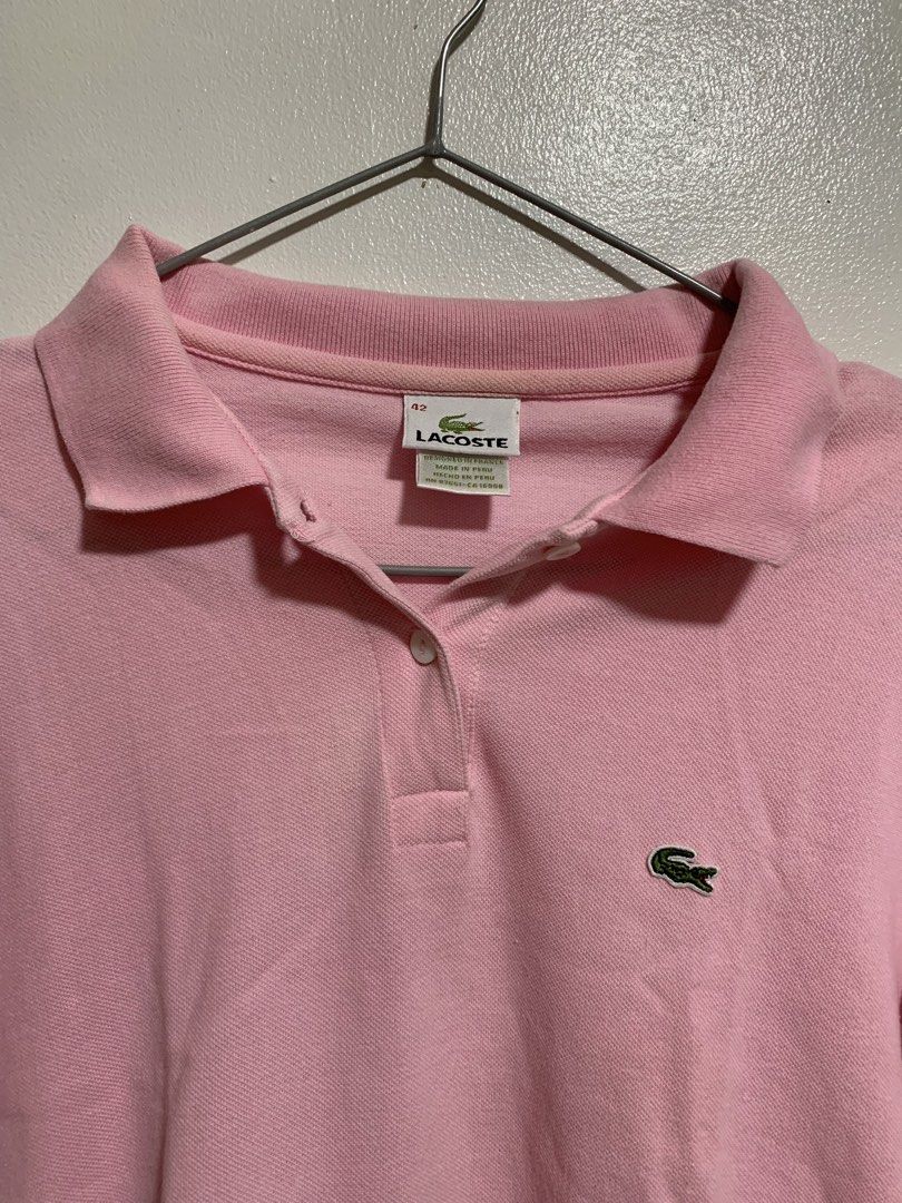 pink Lacoste short-sleeve polo (Category: Shirts) located in Manila. Submitted by nikwieue (Listing ID 1463371527, Image 3). Description: may maliliit na stain, washable naman.