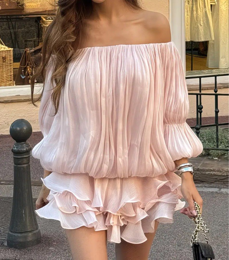 Pink Off-Shoulder Ruffle Dress (Category: Dresses) located in Manila. Submitted by buddybuddy501 (Listing ID 1463381597, Image 1). Description: - Adorable pink off-shoulder dress - Features all-over ruffles and a billowy, flowy top - Ruffled sleeves for extra charm - Ideal for vacations or nights out - Looks even prettier in person! - Versatile: cinch the waist with a belt for a different style.