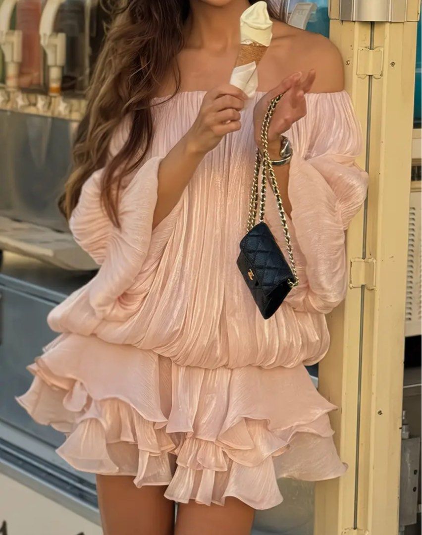 Pink Off-Shoulder Ruffle Dress (Category: Dresses) located in Manila. Submitted by buddybuddy501 (Listing ID 1463381597, Image 2). Description: - Adorable pink off-shoulder dress - Features all-over ruffles and a billowy, flowy top - Ruffled sleeves for extra charm - Ideal for vacations or nights out - Looks even prettier in person! - Versatile: cinch the waist with a belt for a different style.