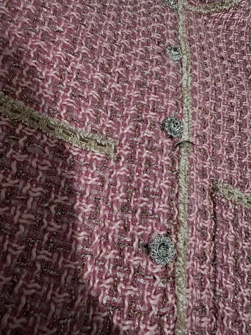 Pink Tweed Jacket with Embellished Buttons (Category: Coats, Jackets and Outerwear) located in Manila. Submitted by everythingsale101 (Listing ID 1463471900, Image 3). Description: - Pink cropped tweed jacket - Textured weave with subtle metallic threads - Four decorative buttons down the front - Two faux chest pockets - Frayed hem detail - Pairs well with jeans or skirts for a chic look Fits L up to38-40 bust -Premium Tweed Blazers bundle availa