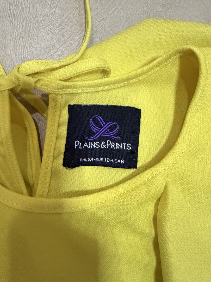 Plains & Prints Yellow Sleeveless Blouse with Ruffles (Category: Blouses) located in Manila. Submitted by abigailyao21949 (Listing ID 1463385688, Image 3). Description: Plains & Prints Yellow Sleeveless Blouse with Ruffles •Size: M •Color: Yellow •Style: Sleeveless with ruffles in front •Slightly used but still in very good condition.