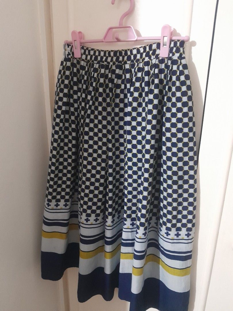 Pleated Skirt (Category: Skirts) located in Quezon City. Submitted by warmturtle.ba931b (Listing ID 1463446103, Image 3). Description: 👗 Pleated Skirt ✨ in a beautiful geometric/checkered design with navy blue, white, and yellow accents 💙 Classic and eye-catching pattern that’s easy to style with a simple top 👗 Approx. length of 29 inches with lovely pleated flow 📏 Approx. waist circumference: up to 33 inches 👌 Ideal for women with a small t