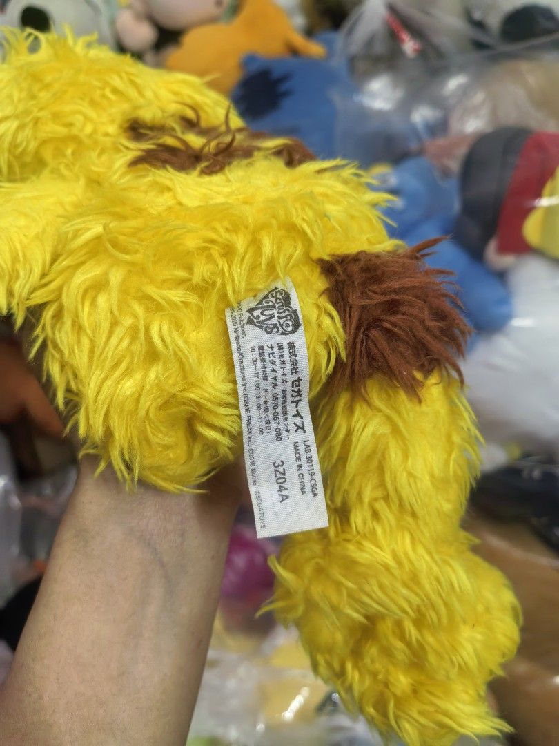 Pokemon Pikachu Plush Toy (Category: Plushies & Soft Toys) located in Paranaque City. Submitted by furugiyafinds (Listing ID 1463396460, Image 3). Description: - Adorable yellow Pikachu plush toy - Features brown accents on back and tail - Made with soft and fluffy material - Ideal for any Pokemon fan - Perfect for display or cuddling - A great addition to any collection.