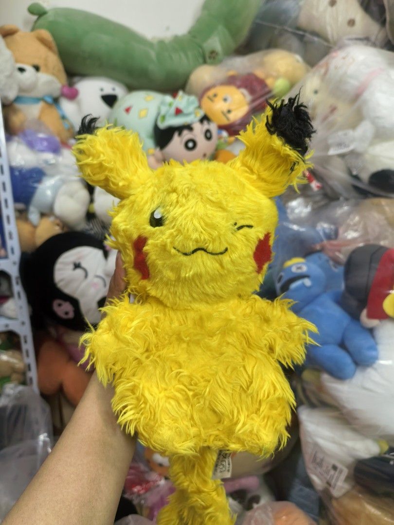 Pokemon Pikachu Plush Toy (Category: Plushies & Soft Toys) located in Paranaque City. Submitted by furugiyafinds (Listing ID 1463396460, Image 1). Description: - Adorable yellow Pikachu plush toy - Features brown accents on back and tail - Made with soft and fluffy material - Ideal for any Pokemon fan - Perfect for display or cuddling - A great addition to any collection.