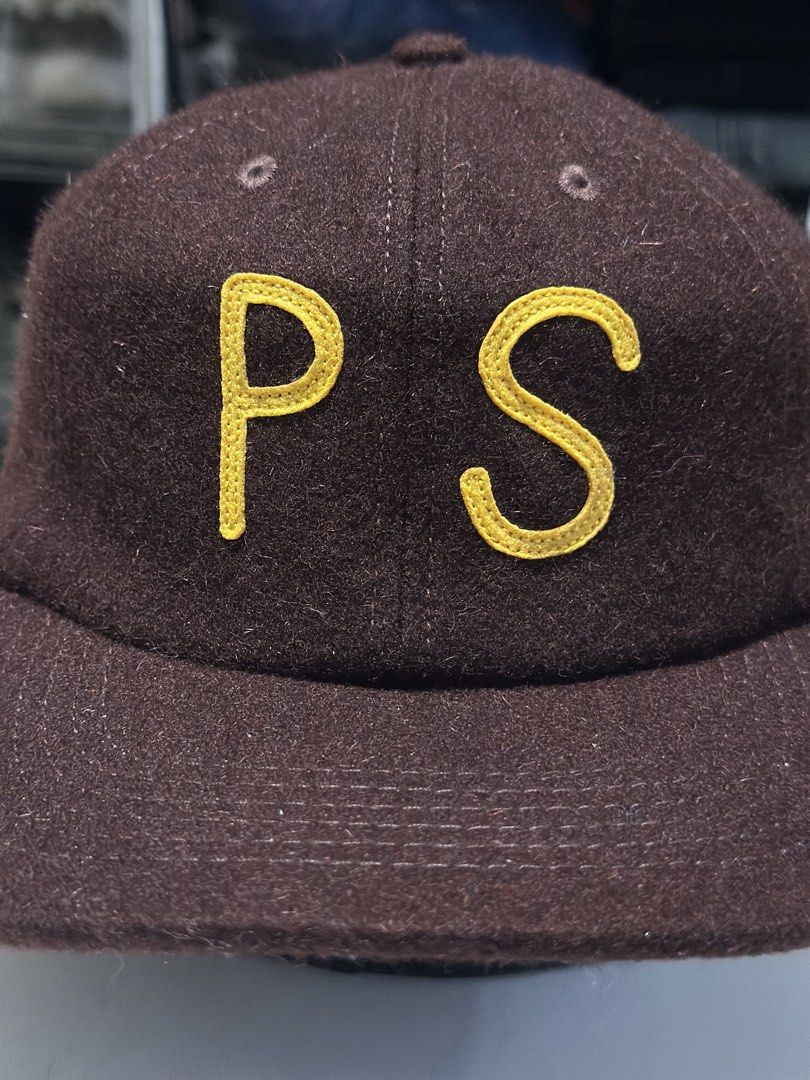 Poler PS Wool Cap (Category: Caps & Hats) located in Daet. Submitted by thrifthings2018 (Listing ID 1463429504, Image 3). Description: - Brown wool cap - Yellow 'PS' embroidery - Adjustable strap for a comfortable fit - Ideal for everyday wear.