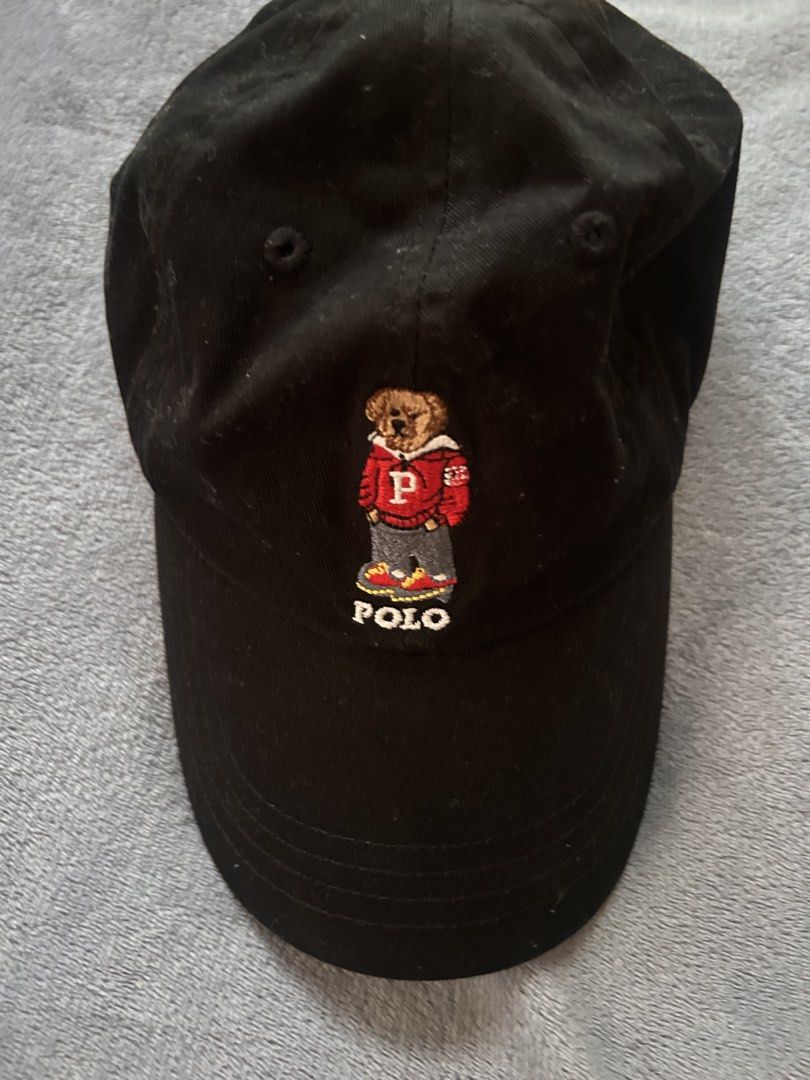 Polo Ralph Lauren Black Bear Cap (Category: Caps & Hats) located in Bulacan. Submitted by sijayyseven (Listing ID 1463363261, Image 1). Description: - Authentic Black Polo Ralph Lauren Cap - Features iconic Polo Bear graphic on the front - 'Polo Ralph Lauren' embroidered on the back - Adjustable strap for a custom, comfortable fit - One size fits most PAYMENT FIRST!!!.