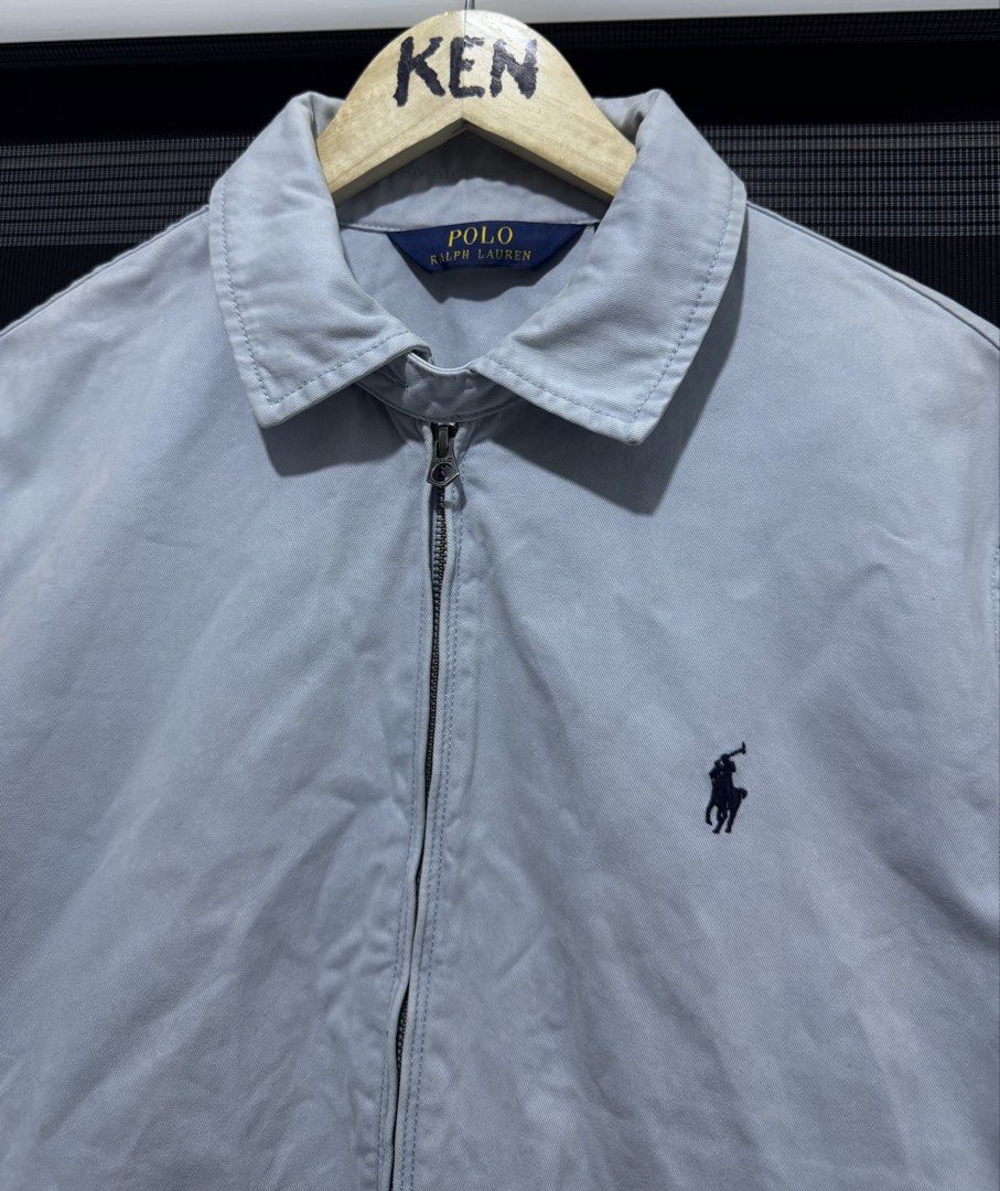 Polo Ralph Lauren Light Blue Harrington Jacket M/M (Category: Coats, Jackets and Outerwear) located in Manila. Submitted by esparciake75752 (Listing ID 1463354694, Image 2). Description: - Light blue Polo Ralph Lauren jacket - Classic Harrington style - Iconic polo player logo on chest - Zipper closure with branded pull tab - Size Medium / 21x26 - Made in China.