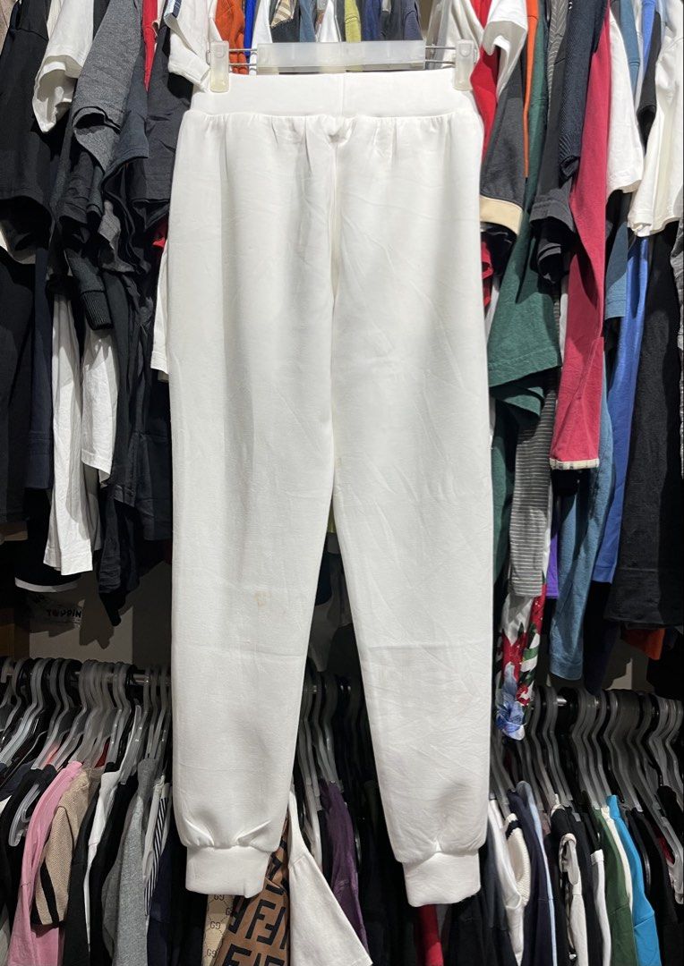 PRADA (Category: Luxury Apparel) located in Iloilo. Submitted by dmclothing10 (Listing ID 1463481604, Image 3). Description: PRADA sweatpants Waistband: 26-32 Length: 37 Excellent good condition 10/10.