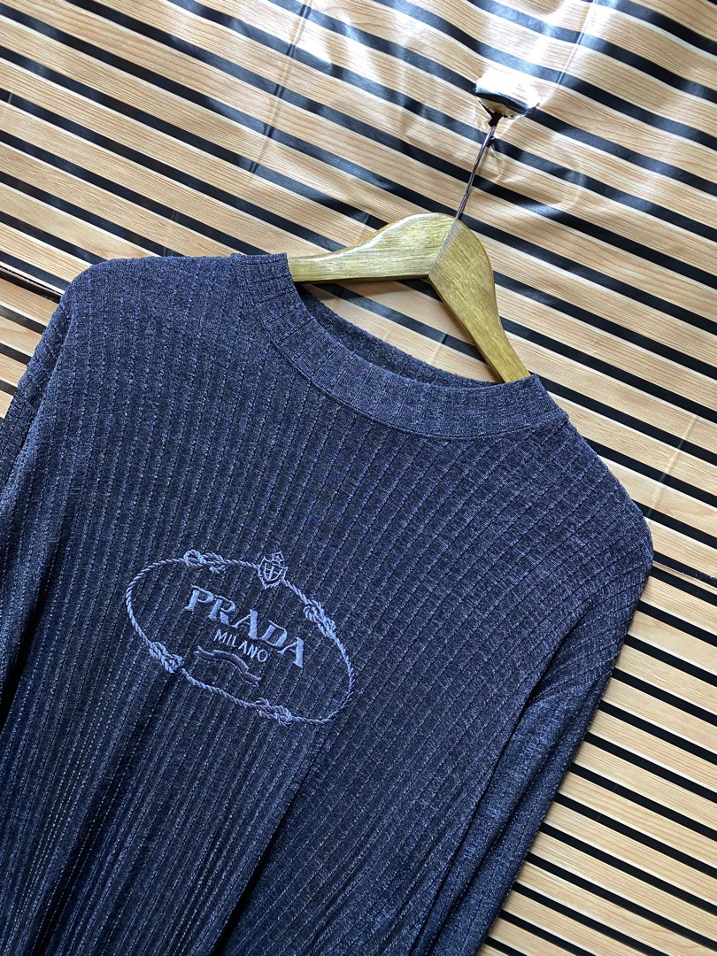 Prada superfine ribbed knit sweater (Category: Longsleeves) located in Makati City. Submitted by drip.poww (Listing ID 1463519590, Image 2). Description: - Prada - Color: Gray - Size: Large - Dimes: 22x29 - Authentic - Excellent condition - Need wash, fresh from bale - Material: 100% Cotton Please don’t expect too much—these are thrifted (ukay) items. 😊 !!STILL NEGOTIABLE!!.