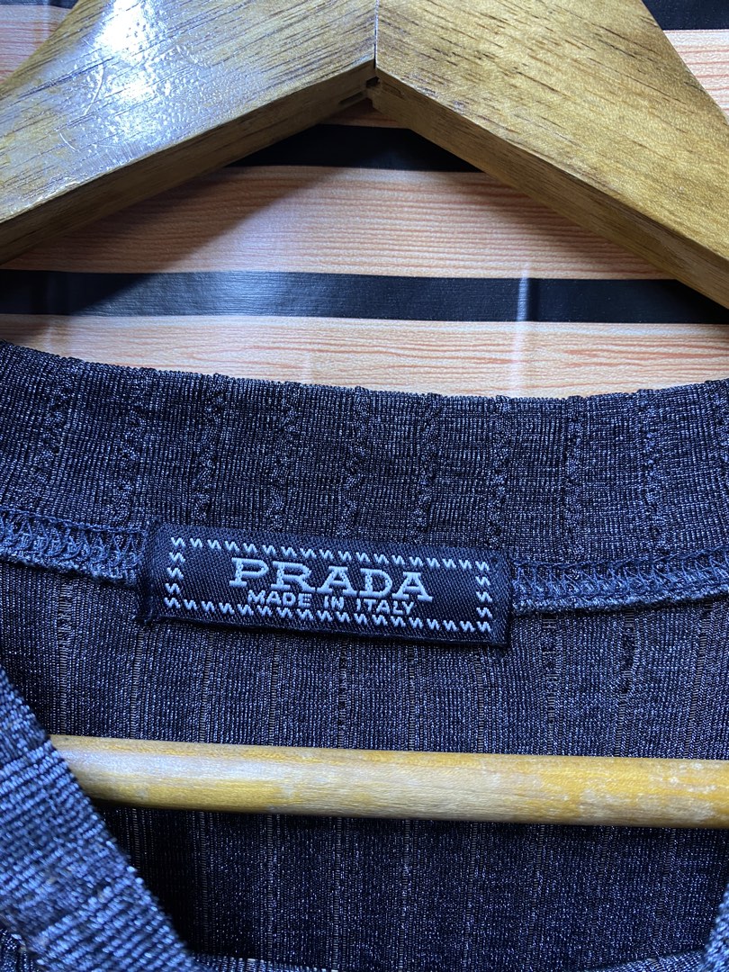 Prada superfine ribbed knit sweater (Category: Longsleeves) located in Makati City. Submitted by drip.poww (Listing ID 1463519590, Image 3). Description: - Prada - Color: Gray - Size: Large - Dimes: 22x29 - Authentic - Excellent condition - Need wash, fresh from bale - Material: 100% Cotton Please don’t expect too much—these are thrifted (ukay) items. 😊 !!STILL NEGOTIABLE!!.