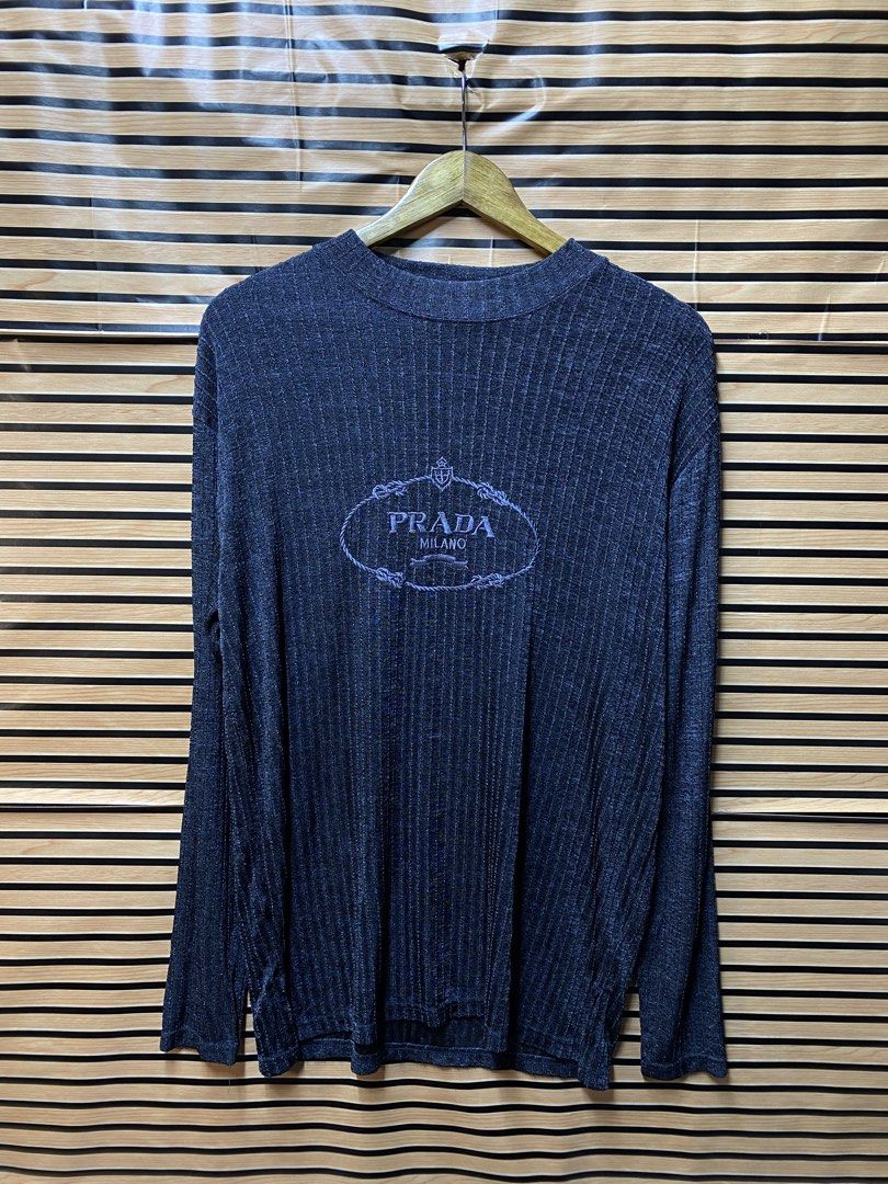 Prada superfine ribbed knit sweater (Category: Longsleeves) located in Makati City. Submitted by drip.poww (Listing ID 1463519590, Image 1). Description: - Prada - Color: Gray - Size: Large - Dimes: 22x29 - Authentic - Excellent condition - Need wash, fresh from bale - Material: 100% Cotton Please don’t expect too much—these are thrifted (ukay) items. 😊 !!STILL NEGOTIABLE!!.