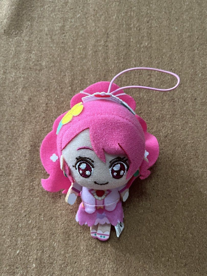 Precure Cure Grace Plush keychain (Category: Plushies & Soft Toys) located in Baguio. Submitted by gaara1234 (Listing ID 1463351735, Image 1). Description: - Adorable pink plush toy - Features big, expressive eyes - Comes with a cute flower accessory in her hair - Includes a convenient pink hanging loop - Approximately 5-6 inches in height - Ideal for anime fans and collectors - Perfect for displaying or as a cute accessory.
