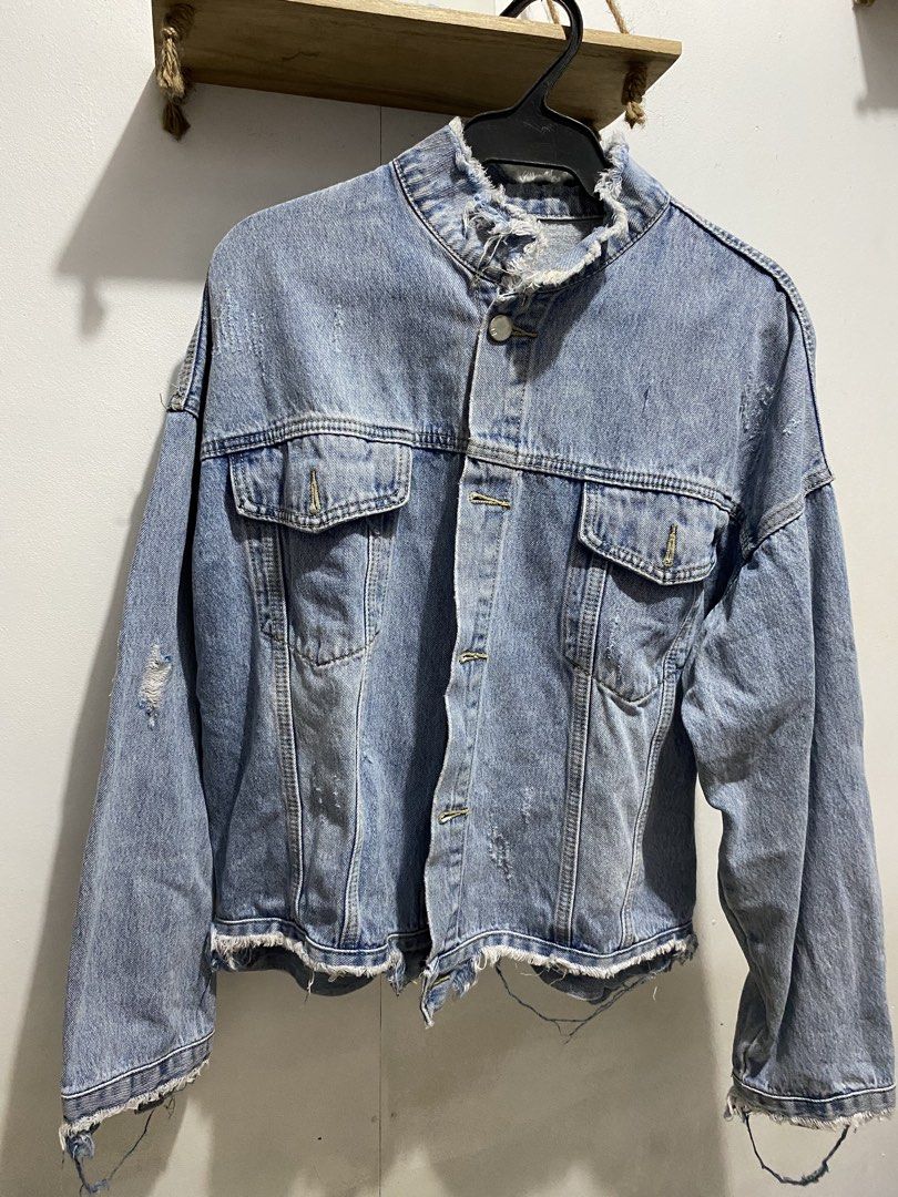 Preloved Bench Rugged Denim Jacket (Category: Coats, Jackets and Outerwear) located in Quezon City. Submitted by sarisari_finds_by_nikki (Listing ID 1463383237, Image 1). Description: Preloved Bench Rugged Denim Jacket | ₱450 Bench Rugged Denim Jacket | Size Large Fits Large to XL depending on preferred fit. ✨ Light wash denim ✨ Rugged/distressed design ✨ Multiple front pockets ✨ Frayed details on collar, sleeves & hem ✨ Stylish oversized/casual 