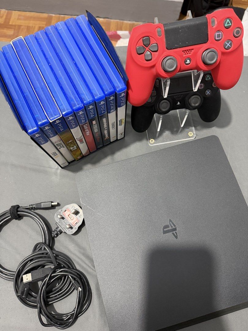 PS4 Slim 1tb w/ box & receipt + controller & games (Category: PlayStation) located in Calamba. Submitted by lasania (Listing ID 1463422086, Image 2). Description: - PlayStation 4 Slim Console - with box & receipt - Two DualShock 4 Controllers (1 Red, 1 Black) with silicone case - with games - All cables complete - Unit used less than 5x - Almost new, no dents..