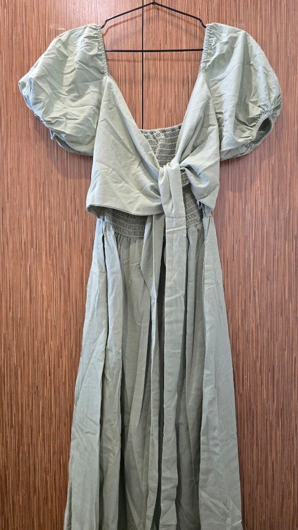 Puff Maxi Dress (Category: Dresses) located in Cebu City. Submitted by kitty_12345_ (Listing ID 1463391690, Image 2). Description: Like new - Sage green maxi dress - Brand: Sunday Classics - Smocked bodice - Puff sleeves - Square neckline with tie detail - Flowy skirt - Ideal for casual outings or beach days.