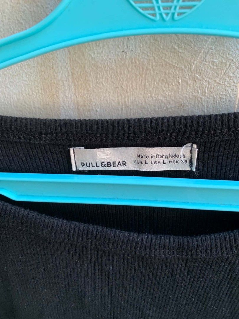 Pull & Bear Black Ribbed Long Sleeve Top (Category: Longsleeves) located in Manila. Submitted by usagichan_rabbit (Listing ID 1463341655, Image 2). Description: - Brand: Pull & Bear - Color: Black - Style: Ribbed long-sleeved top - Size: L (EUR, USA, MEX 30) - Origin: Made in Bangladesh - Features: Simple, versatile, comfortable fabric - Usage: Great for layering or wearing on its own.